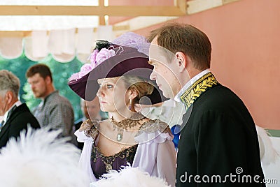 Portrait of a couple in historical costumes.