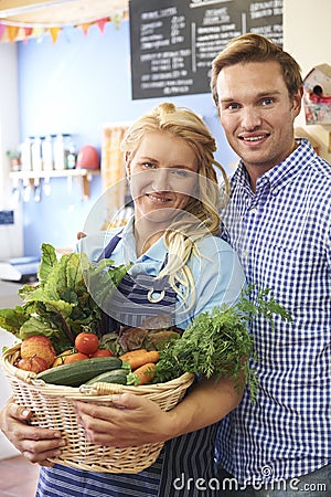 Portrait Of Couple Running Organic Food Shop