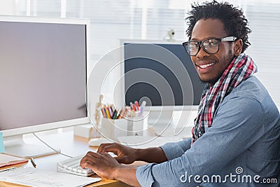 Portrait on a creative business worker on computer