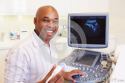 Portrait Of 4D Ultrasound Scanning Machine Operator And Doctor