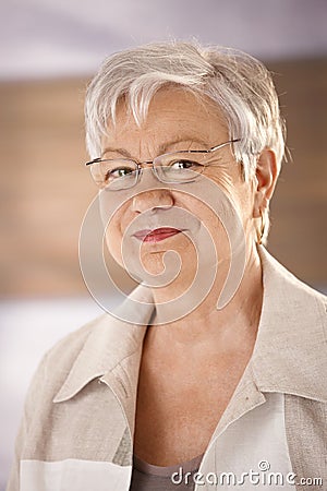 Portrait of elderly woman with glasses