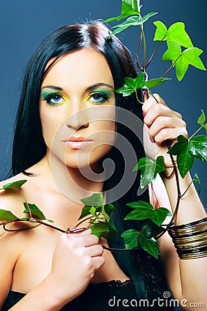 Portrait of female model, beauty woman and flowers