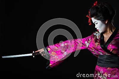 Portrait of geisha warrior with sword