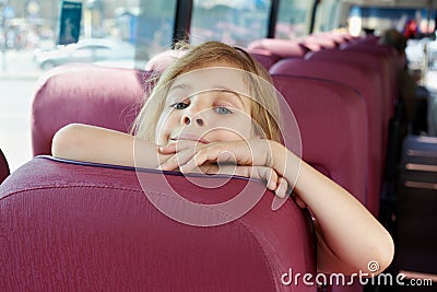Portrait of girl on bus seat