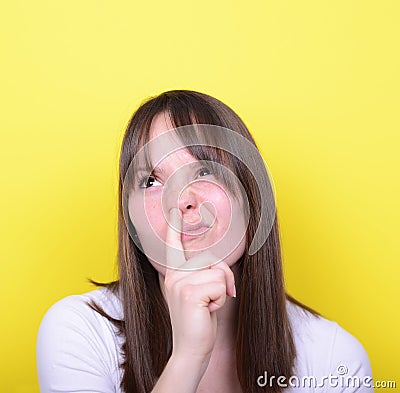 Portrait of girl with finger in her nose