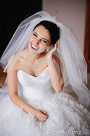 Portrait of a Gorgeous bride bursts of laughing