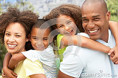 Portrait of Happy Family In Park