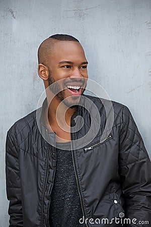 Portrait of a happy young man laughing