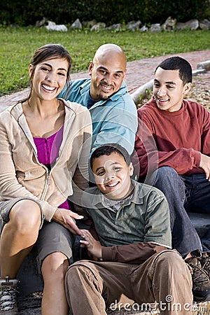 Portrait of Hispanic family outdoors