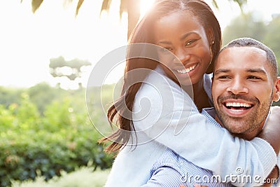 Portrait Of Loving African American Couple In Countryside