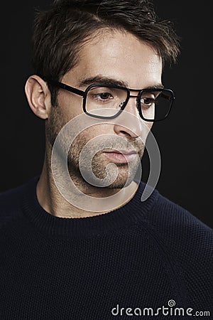 Portrait of mid adult man wearing glasses