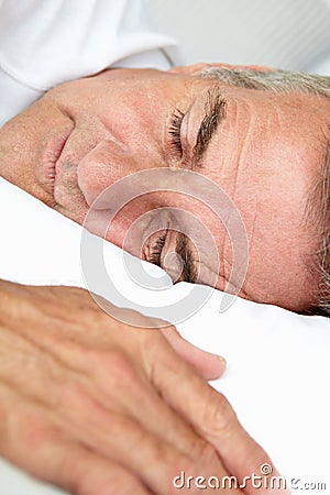 Portrait of mid age man sleeping