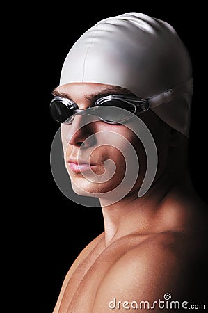 Portrait of muscular male swimmer with full equipment