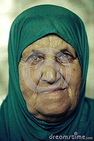 Portrait of a Muslim Woman in a Blue Head Scarf