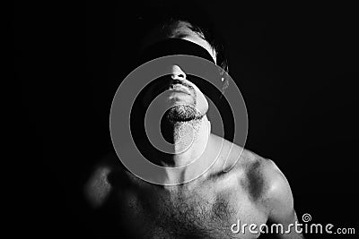 Portrait of nude young men blindfolded