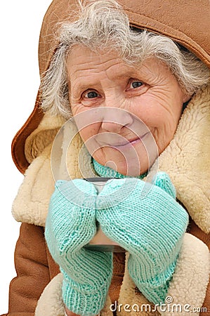Portrait old woman with mug of hot tea