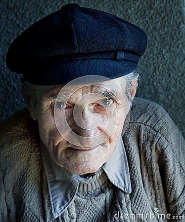 Portrait of one friendly old senior man