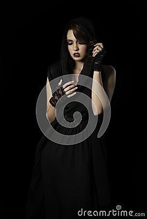 Portrait of sensual brunette woman with gloves