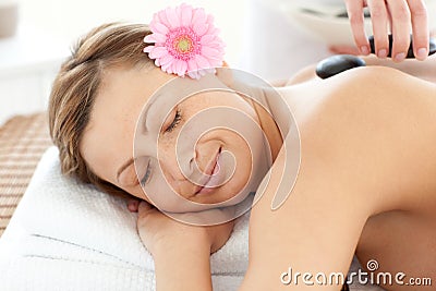 Portrait of a sleeping woman having a flower