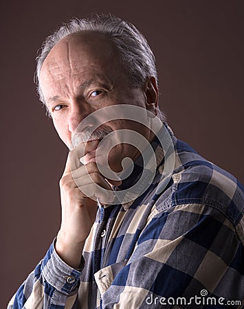 Portrait of a smiling elderly man