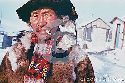 Portrait of smoking man of indigenous people Chukchi