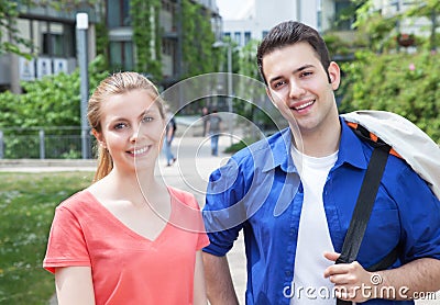 Portrait of two students on campus