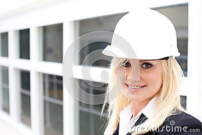 Portrait of woman with construction helmet