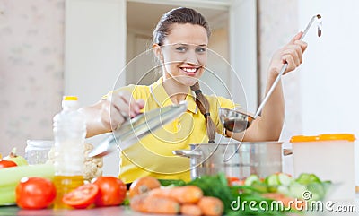 Portrait of woman cooking vegetarian food