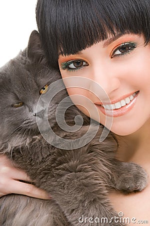 Portrait of woman with funny kitten