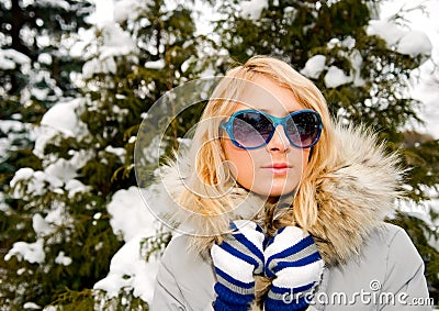Portrait of young beautiful woman in sun glasses