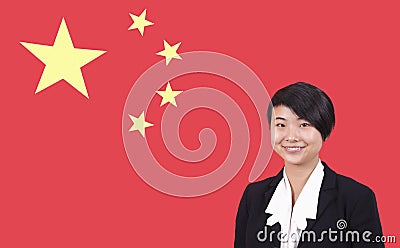 Portrait of young businesswoman smiling over Chinese flag