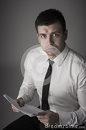 Portrait of young impressive business man