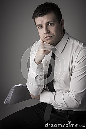 Portrait of young serious business man