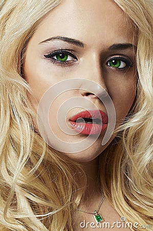 Portrait of young woman.beautiful blond girl with green eyes