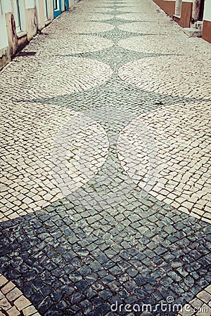 Portuguese traditional patterned cobblestones in Lagos Portugal