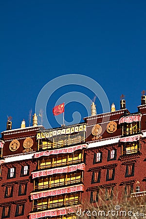 Potala Palace Lhasa Tibet with Chinese flag