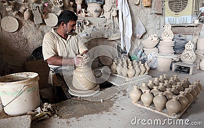 Potter in a pottery workshop