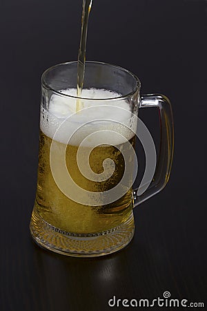 Pouring beer into a glass