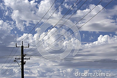 Power lines in Cloudy Urban Skyscape