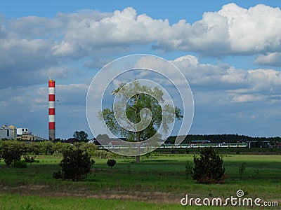 Power station, meadow, train and blue sky with nic