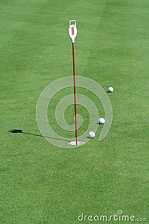 Practice putting green with golf balls