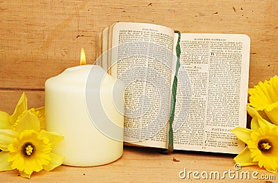 Prayer book and candle