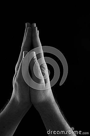 Praying hands of a man