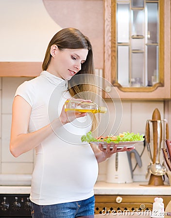 Pregnant mother in kitchen