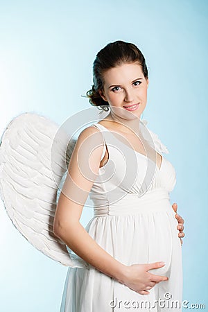 Pregnant woman with angel wings