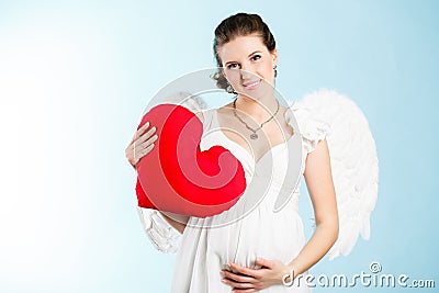 Pregnant woman with angel wings