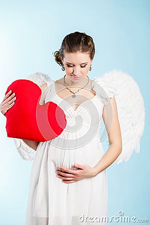 Pregnant woman with angel wings
