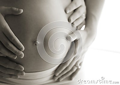 Pregnant woman belly exposed