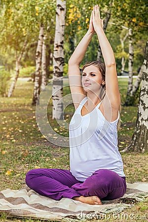 Pregnant woman doing relaxing breathing exercise