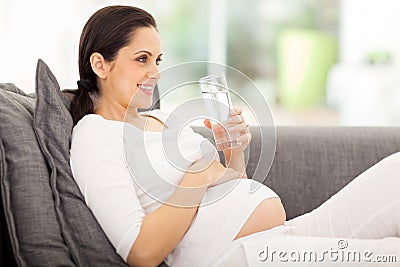 Pregnant woman drinking water